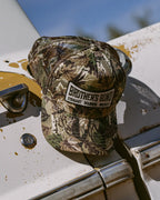 Camo Wordmark Trucker Hat
